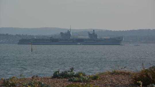 Image ID 2JTBGEJ HMS Prince of Wales returning to the Solent off Portsmouth, after breaking down off the Isle of Wight on its way for US exercises 29082022 CREDIT PA, Alamy Stock Photo.jpg