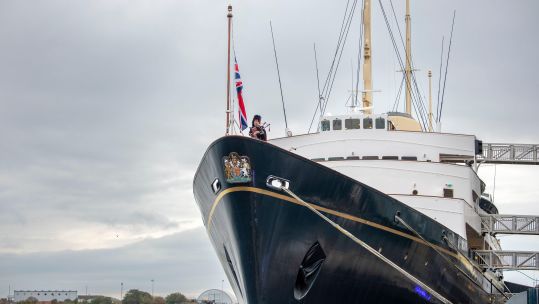 Image ID 2K1JWE4 Piper aboard the Royal Yacht Britannia, moored in Leith, Edinburgh PA Alamy 19092022 EXP 07112023.jpg