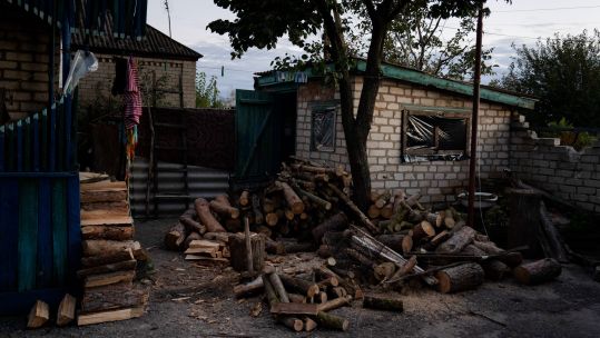 A pile of logs seen gathered outside a house in Lyman (Picture: Sipa US/Alamy Stock Photo).
