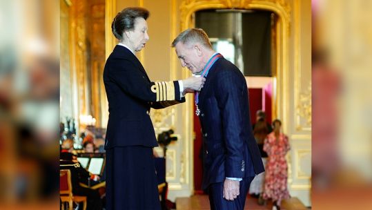 Image ID 2K7MH6P Daniel Craig made COmpanion of the Order of St Michael and St George by the Princess Royal 18102022 CREDIT PA, Alamy.jpg