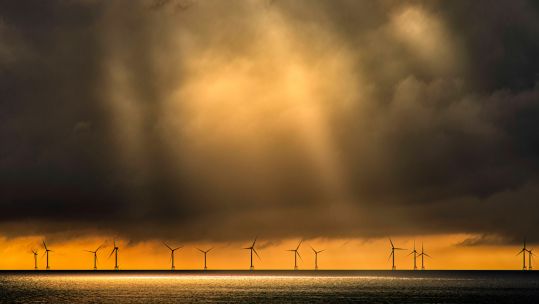 Wind turbine sunset (Picture: Christopher Drabble/Alamy Stock Photo).