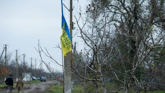 A Ukrainian national flag is seen at a village in Kherson Oblast (Picture: ZUMA Press/Alamy Stock Photo).