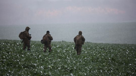 Image ID 2KF9MW5 Polish soldiers near the site of the explosion in Przewodow, eastern Poland near Ukraine border 17112022 CREDIT REUTERS,Alamy Stock Photo EXP 20112023.jpg