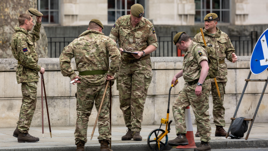 Soldiers in Whitehall mark out the route for the coronation (Picture: Alamy Live News)