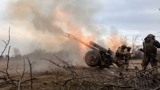 Artillerymen from the Ukrainian armed forces shooting from 122 mm howitzer D-30 into Russian positions near Bakhmut