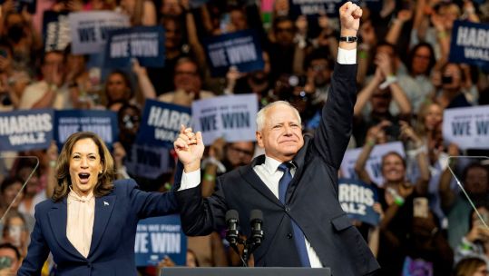 Kamala Harris and Tim Walz on stage at the rally in Philadelphia