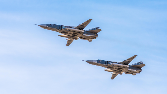 Russian supersonic front-line bombers Sukhoi Su-24 in the sky (Picture: Alamy)