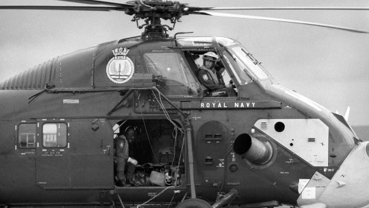 Image ID G47H8B The Prince of Wales at the controls of his Wessex helicopter as he was about to take-off at Royal Naval Air Station Yeovilton, to lead a massed flypast of helicopters of 707 Squadron CREDIT ALAMY 280423.png