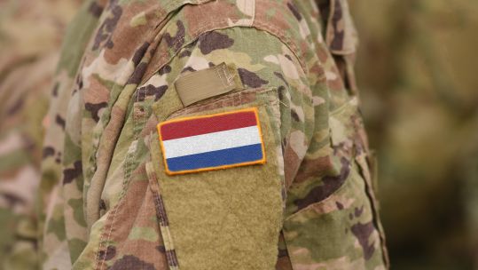 Image ID R5K67K Flag of Netherlands on soldiers arm 03092018 CREDIT Alamy Stock Photo.jpg