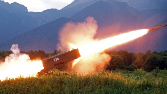 A BM-1 combat vehicle takes part in live firing exercises for TOS-1A Solntsepyok heavy flamethrower units at Tarskoye firing range in Russia