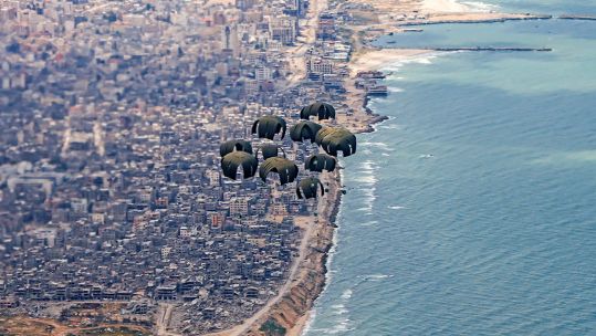 Image of humanitarian aid, seen here being airdropped over Gaza from a RAF A400M aircraft 260324 CREDIT MOD