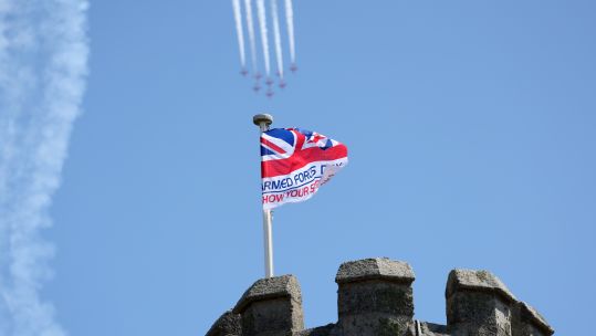 Image of the Red Arrows, seen here with Pendennis Castle in the foreground in Falmouth for Armed Forces Day 240623 CREDIT MOD