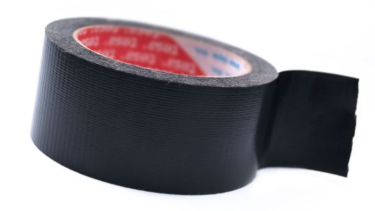 Image ID DC89RC Black Nasty Industrial Duck Tape Duct Tape CREDIT Altin Osmanaj Alamy Stock Photo