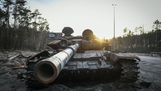 Russian tanks destroyed in the outskirts of Kyiv with Wolverines sprayed on the barrel (Picture: Piero Cruciatti/Alamy).