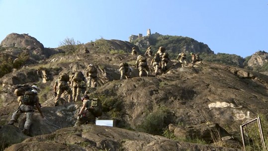 Royal Anglian Regiment reservists climb to Sacra di Saint Michele Monastery. 