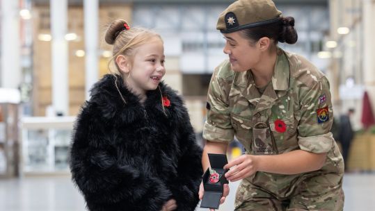 Ivy Knighton-Leake, one of the country’s youngest Poppy Appeal collectors, launches 2026 campaign with Private Katie Brazier of the Royal Anglian Regiment 221026 CREDIT Royal British Legion