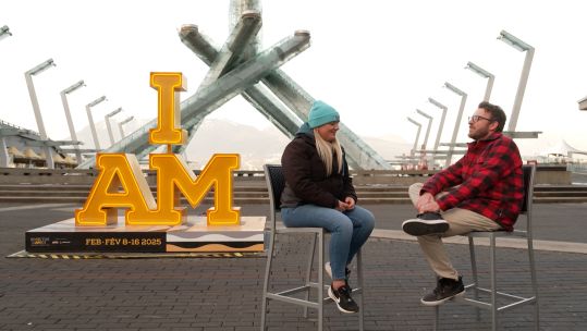 JJ Chalmers with Cath Brazier outside Invictus sign at Vancouver Credit BFBS DATE Feb 2025.jpg