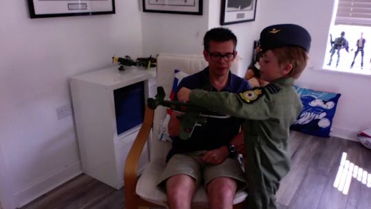 Jacob the Pilot shows an aircraft to his Dad.