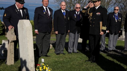 Japanese Defence attache at grave of WW1 Japanese sailor