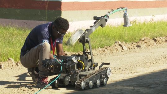 Jerry operating a counter IED robot at the Humanitarian Peace Support School in Nairobi CREDIT BFBS.jpg