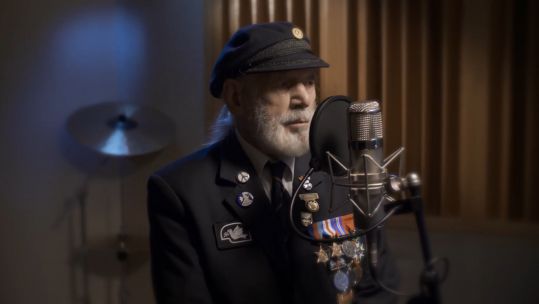 Jim Radford singing in studio (Picture: 'The Shores of Normandy'/Snappin' Turtle & TBI Media).