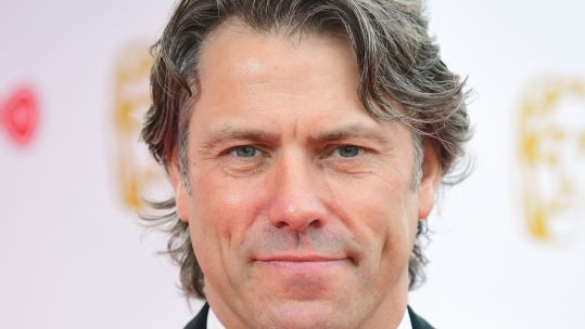 Cover image: John Bishop in 2018 (Picture: PA).