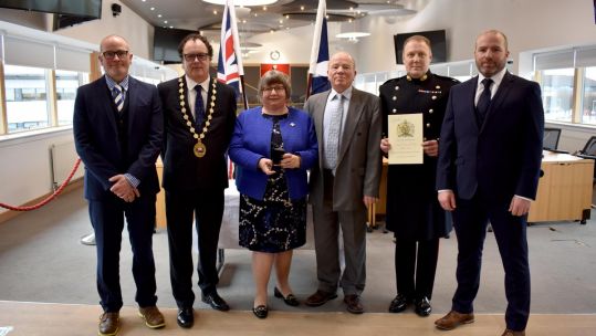 Kathleen Pollock receives the Elizabeth Cross 210219 CREDIT East Dunbartonshire Council .jpg	