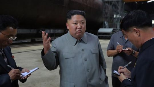 Kim Jong Un at a submarine site 230719 CREDIT KCNA.JPG