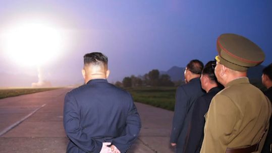 Kim Jong Un watches August 2019 missile launches 070819 credit KCNA.jpg