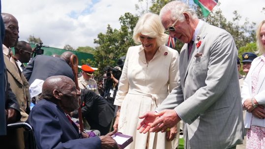 King Charles III and Queen Camilla meet veteran Samwel Nthigai Mburia, who is believed to be 117 years old, to present him with WWII medals