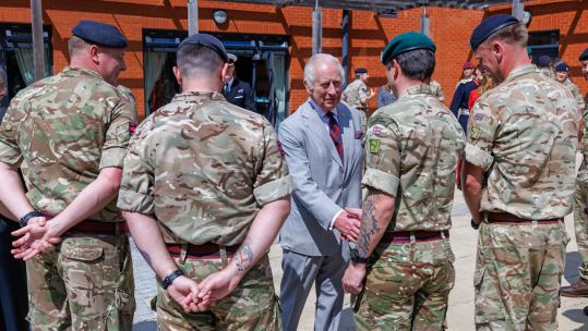 King Charles III shaking hands with soldiers from 3 Royal School of Military Engineering during his visit to Gibraltar barracks (Picture: PA).