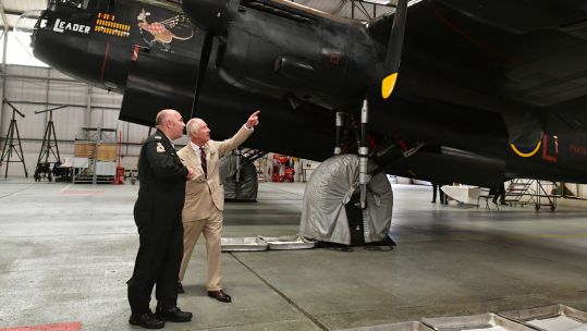 King Charles III speaks with Seb Davey from the BBMF during a visit to Coningsby (Picture: PA).