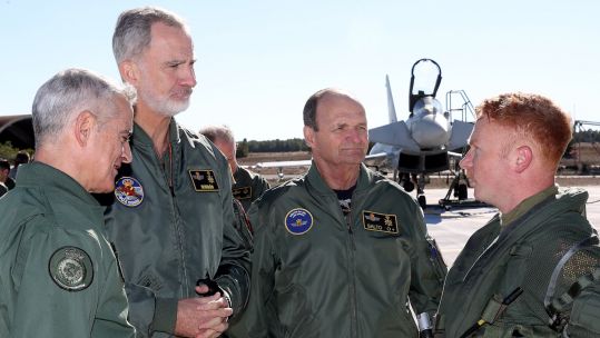 King Felipe VI of Spain speaking with a member of the Royal Air Force at Llanos Air Base (Picture: Royal Air Force).