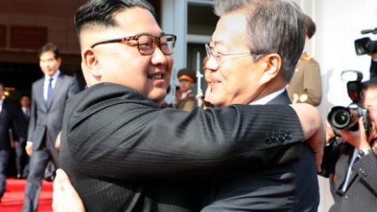 The two Korean leaders embrace as they meet for a second time in a month (Picture: PA).