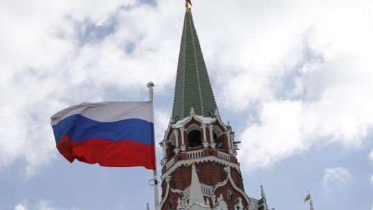 Cover Image: Russian flag outside the Kremlin (Credit: PA Images)