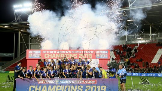 Leeds Rhinos Women celebrate after winning after the Betfred Women's Super League Grand Final at the Totally Wicked Stadium, St Helens