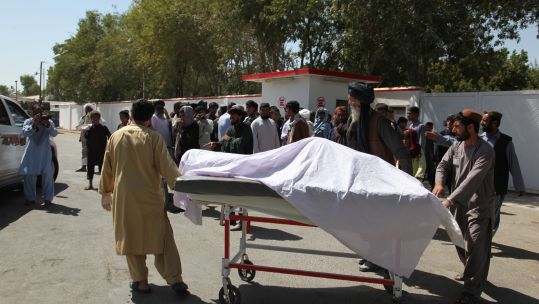 Local people carry the body of a civilian in Lashkar Gah, capital of Helmand province, Afghanistan 230919 CREDIT PA.jpg