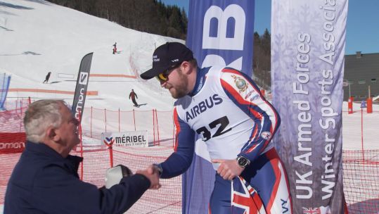 Lt Brett Wild getting a medal Credit BFBS DATE Feb 2025.jpg