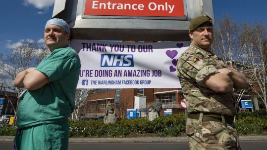 Lt Col Moxley (right) and his twin brother Paul Moxley (left) join forces against Coronavirus at NHS Nightingale London 040420 CREDIT MOD.jpg