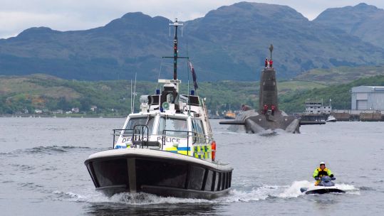Cover image: MOD Police working with the Royal Navy (Picture: MOD).