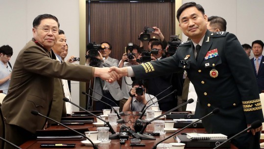 Maj. Gen. Kim Do-gyun and Lt. Gen. An Ik-san meeting for Koreas military talks CREDIT PA