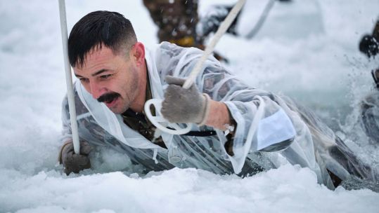 Royal Marine takes on ice breaking drills in Norway