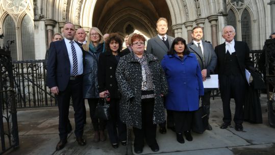 Mark Tipper, Sarah-Jane Young and other family members of Hyde Park bombing victims outside High Court
