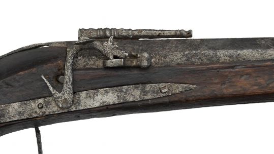 A photograph of a muzzle-loading matchlock arquebus 