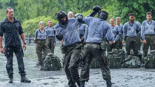 Matt Hancock and Jermaine Pennant take on the milling challenge on series five of Celebrity SAS Who Dares Wins CREDIT Channel 4