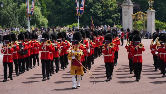 Members of the Band of the Grenadier Guards outside Buckingham Palace for state visit 25062024 CREDIT PA