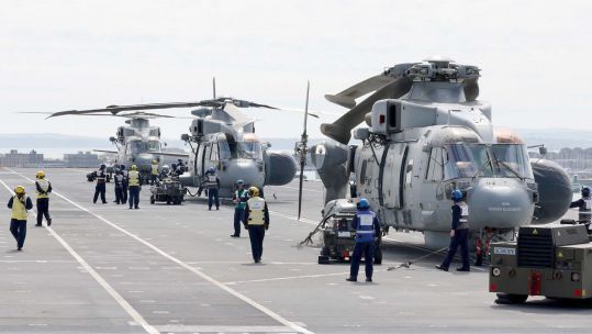 Merlin helicopters on HMS queen elizabeth deck ahead of her maiden deployment 270421 CREDIT Royal Navy