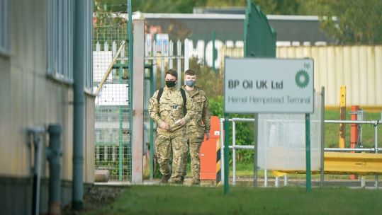 Military personnel at Buncefield oil depot, known as Hertfordshire Oil Storage Terminal, in Hemel Hempstead
