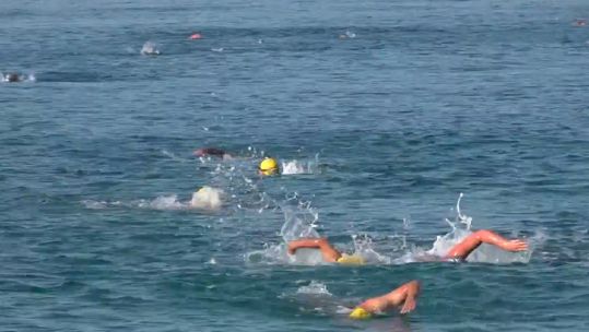 Military personnel from British Forces Cyprus take part in Bay 2 Bay swim 2022 080722 CREDIT BFBS.