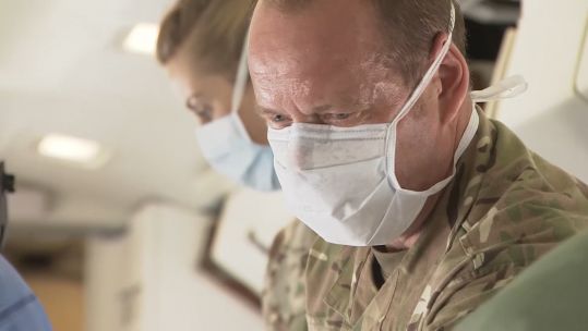 Military personnel on modified BAe 416 modified to carry covid19 coronavirus patients 160620 CREDIT BFBS.jpg